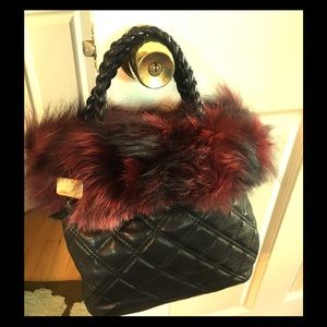 Paolo Masi black leather tote with dark red fur